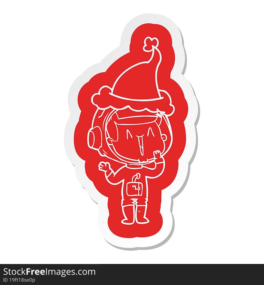 laughing quirky cartoon  sticker of a astronaut wearing santa hat