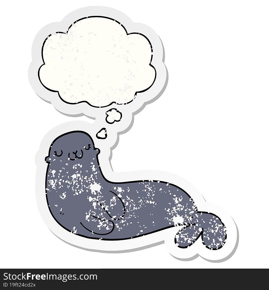 cute cartoon seal and thought bubble as a distressed worn sticker