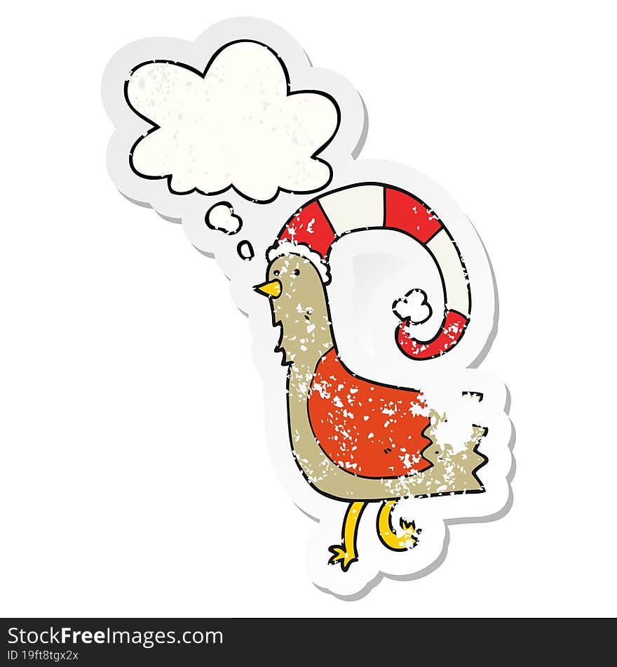 cartoon chicken in funny christmas hat and thought bubble as a distressed worn sticker