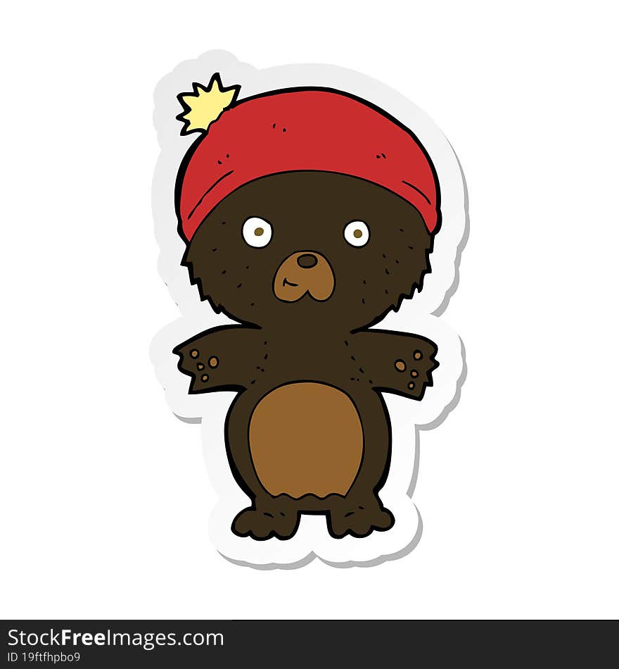 sticker of a cartoon cute black bear in hat