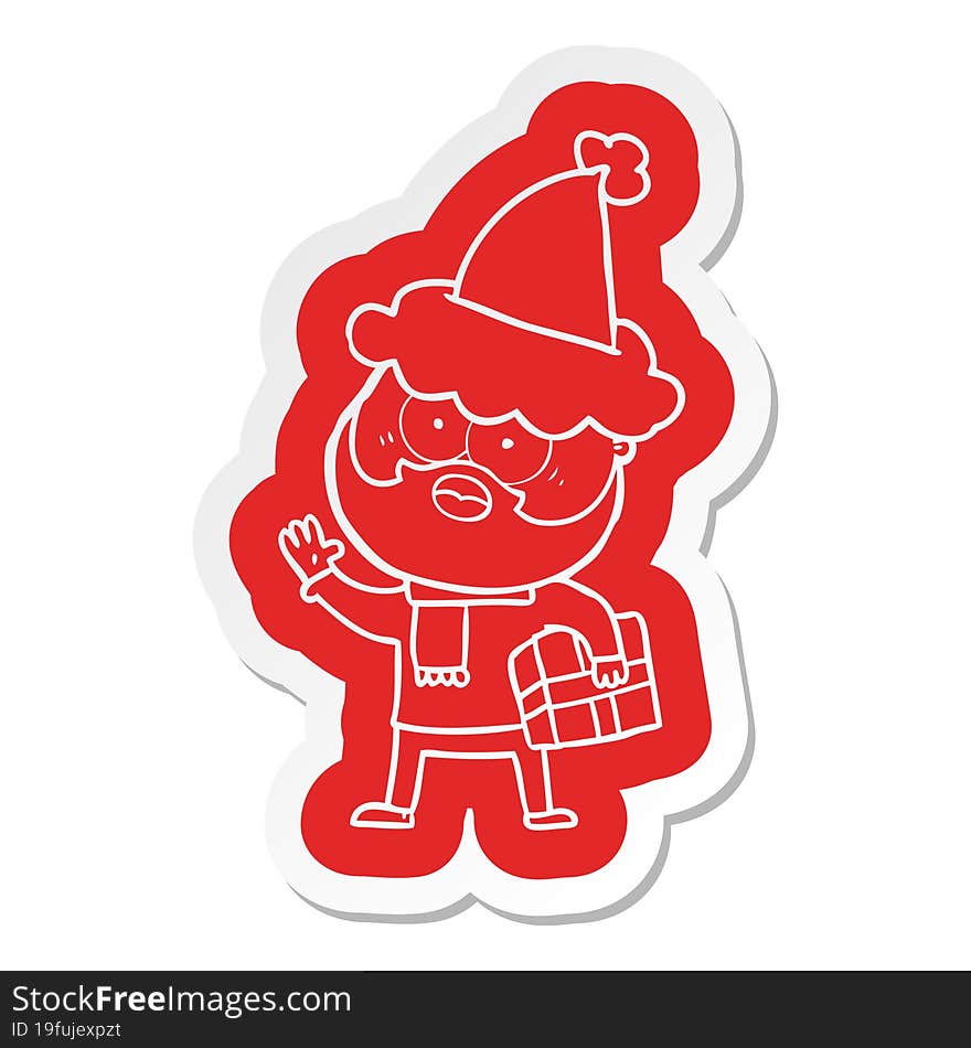 quirky cartoon  sticker of a bearded man with present wearing santa hat