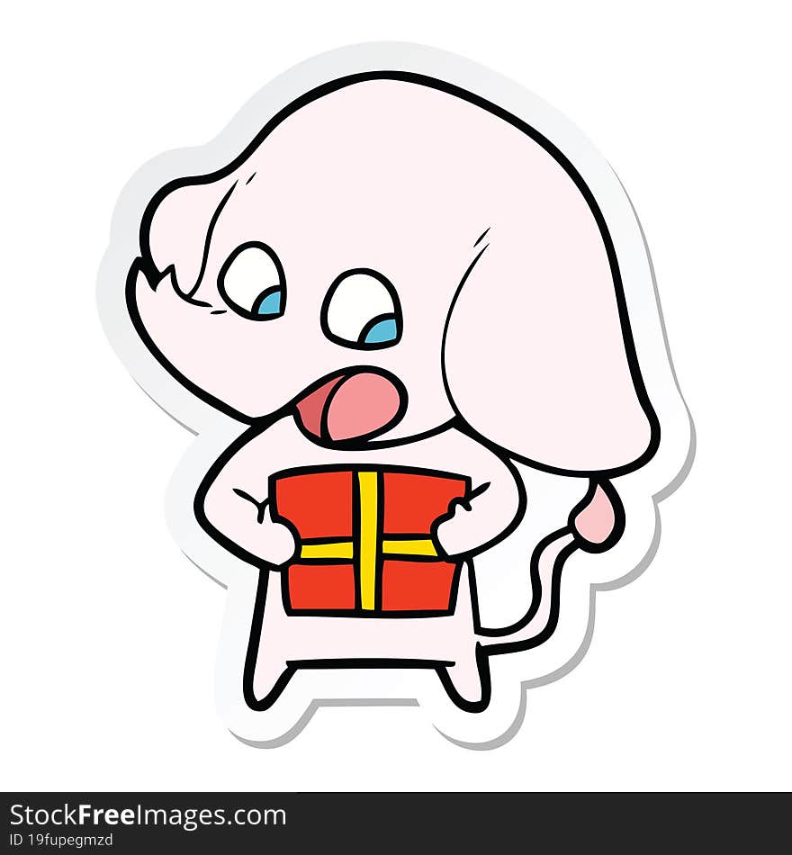 sticker of a cute cartoon elephant with christmas present