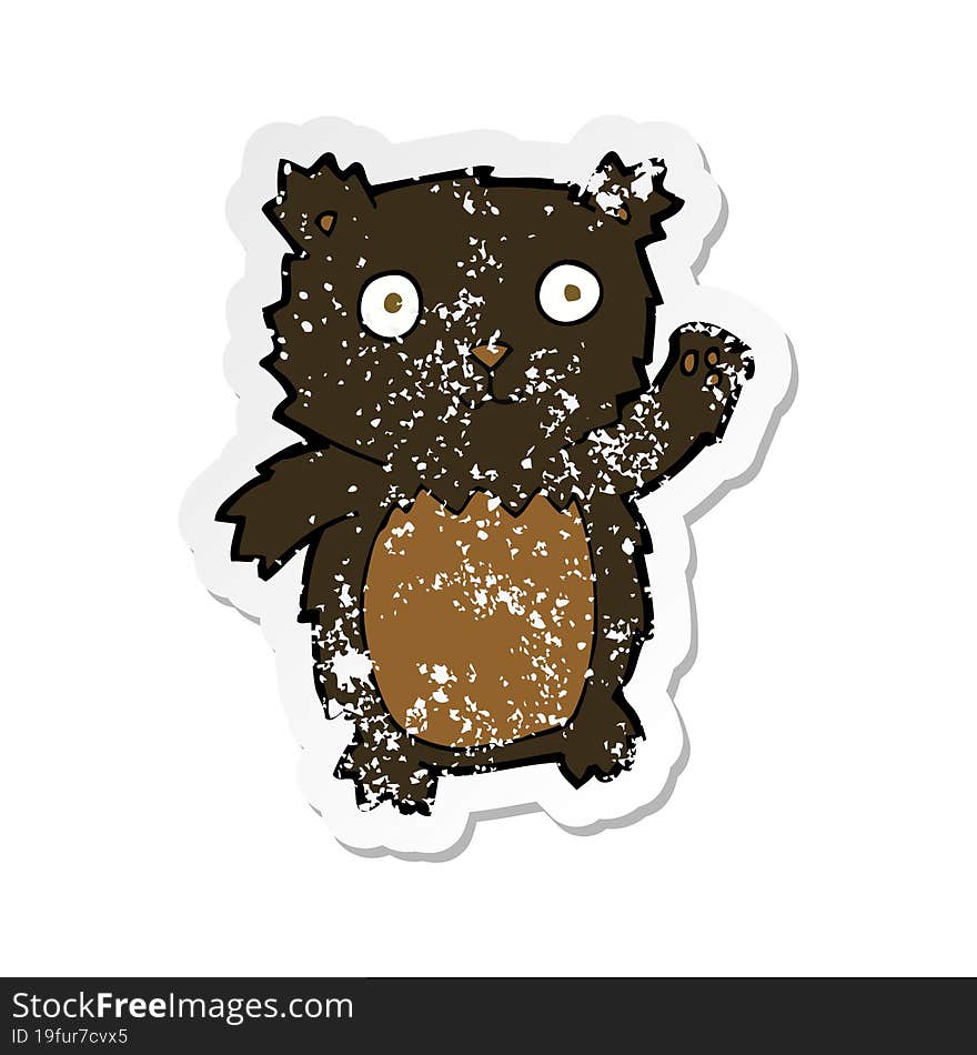 retro distressed sticker of a cartoon waving black bear cub