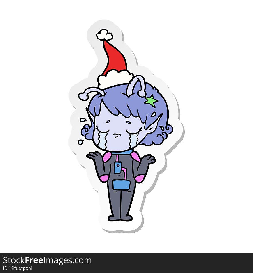 hand drawn sticker cartoon of a crying alien girl wearing santa hat