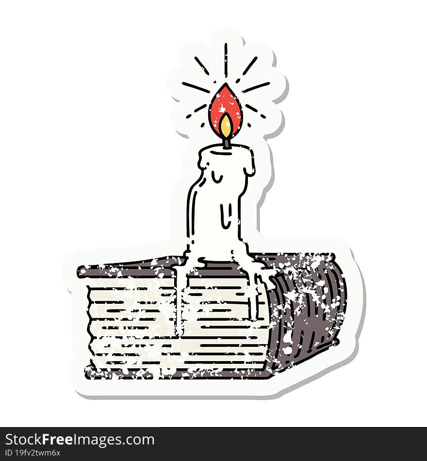 grunge sticker of tattoo style candle melting on book