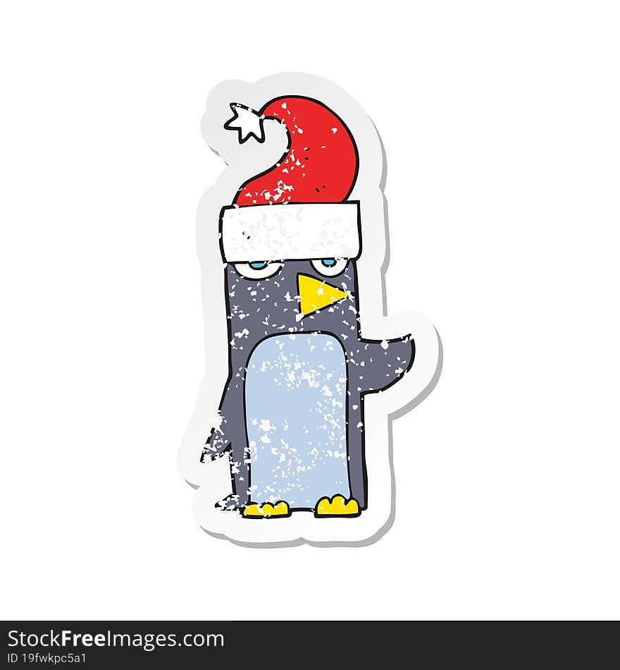 retro distressed sticker of a cartoon penguin in christmas hat