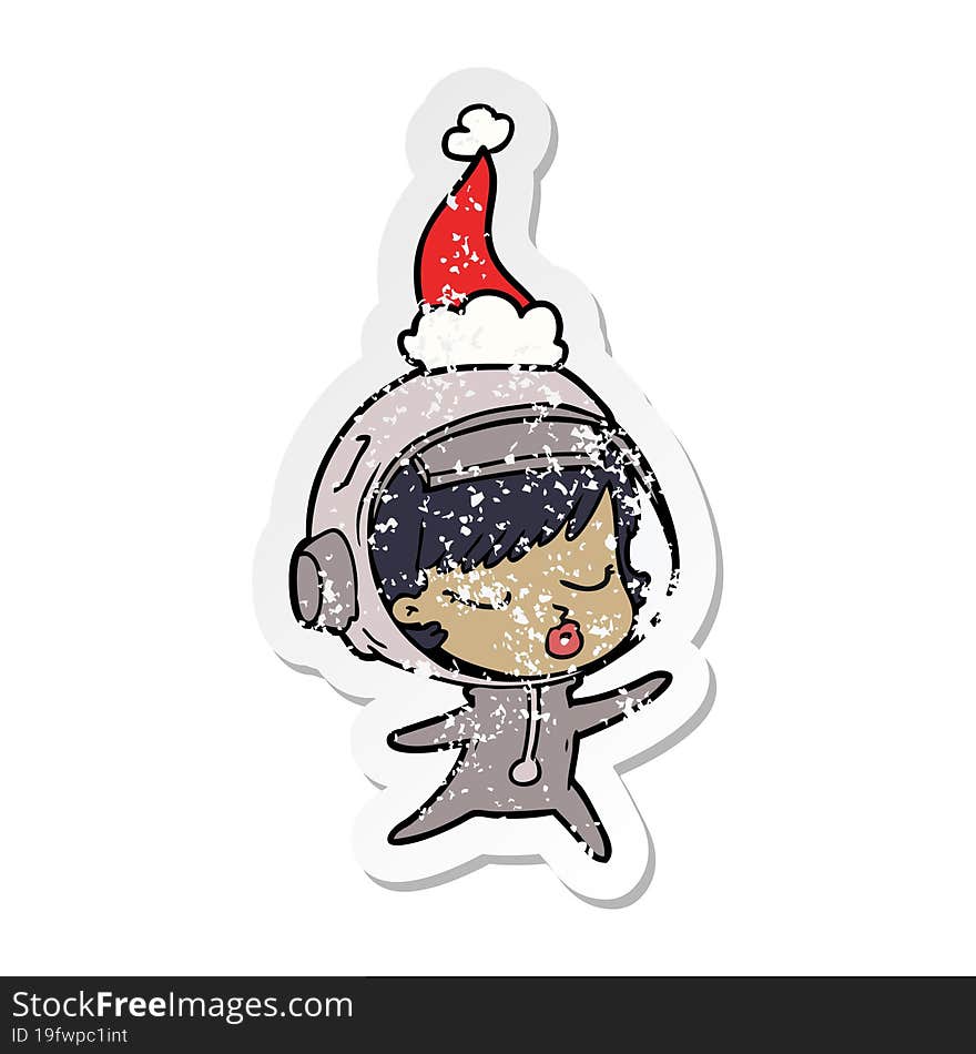 distressed sticker cartoon of a pretty astronaut girl wearing santa hat