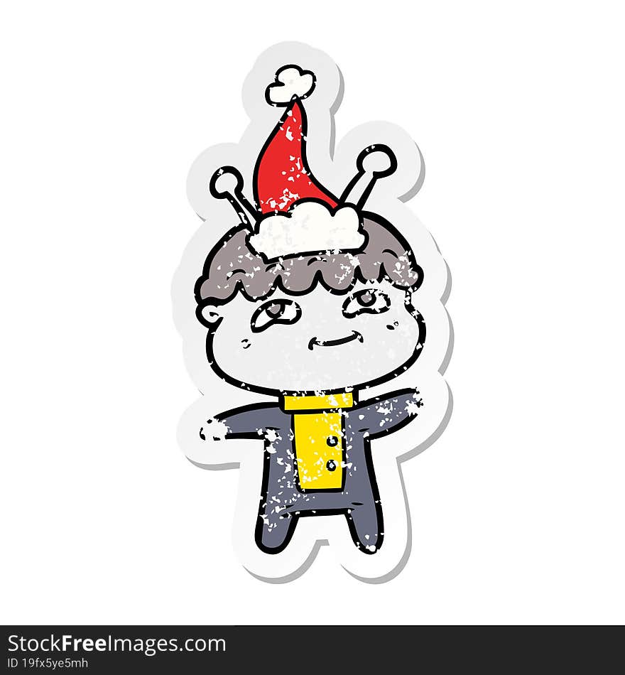 Friendly Distressed Sticker Cartoon Of A Spaceman Wearing Santa Hat