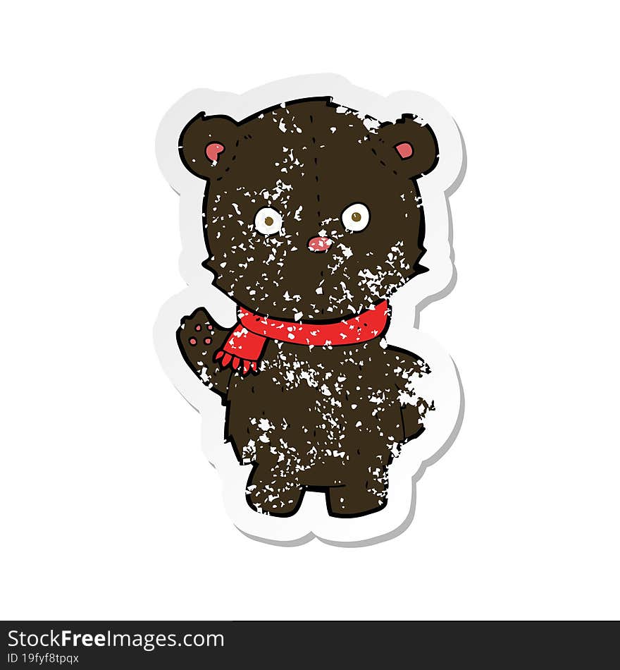 retro distressed sticker of a cartoon waving black bear cub