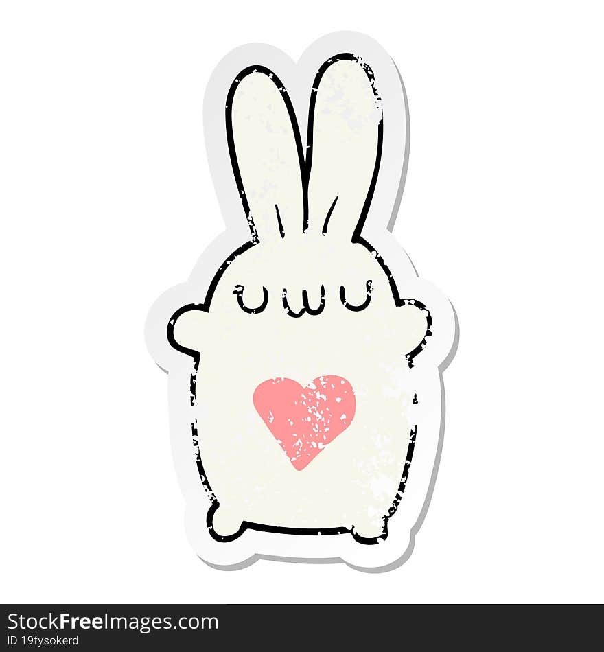 distressed sticker of a cute cartoon rabbit with love heart