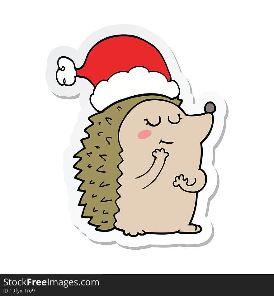 sticker of a cartoon hedgehog wearing christmas hat