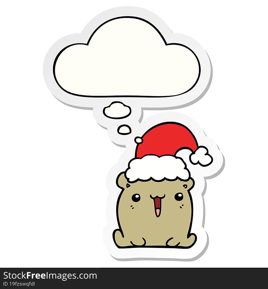 cute cartoon bear with christmas hat and thought bubble as a printed sticker