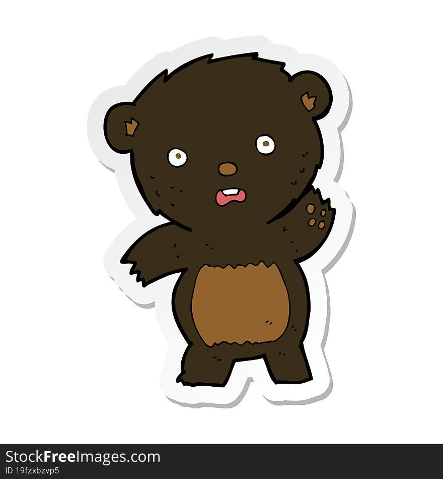 sticker of a cartoon waving black bear cub