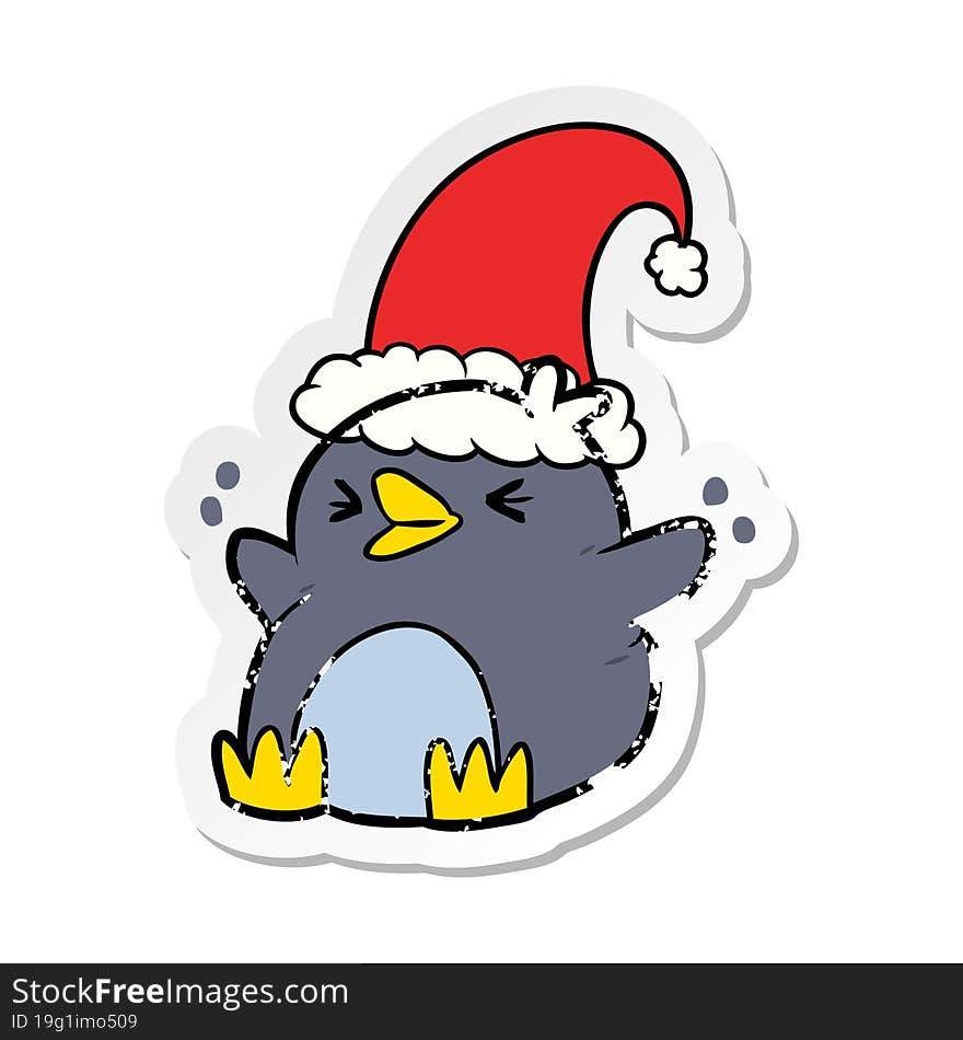 distressed sticker of a cartoon penguin wearing christmas hat