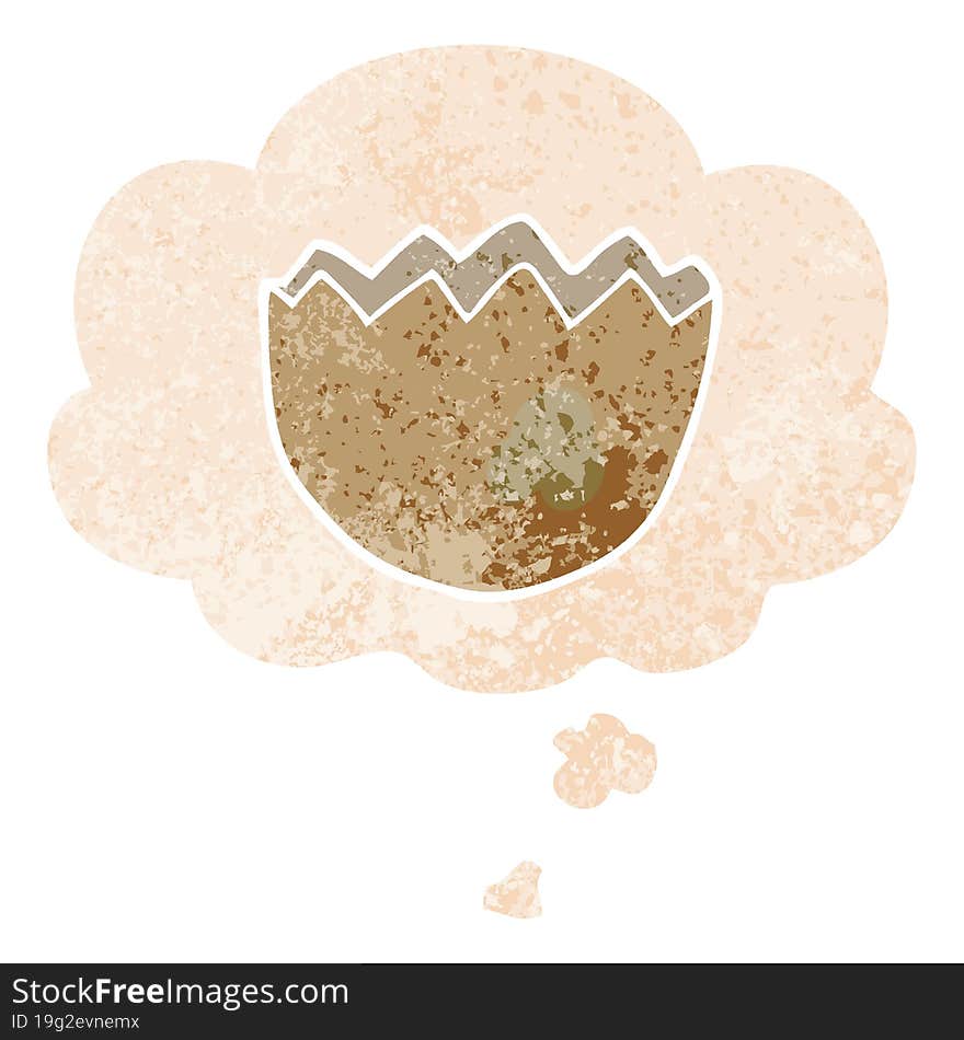 cartoon cracked eggshell and thought bubble in retro textured style