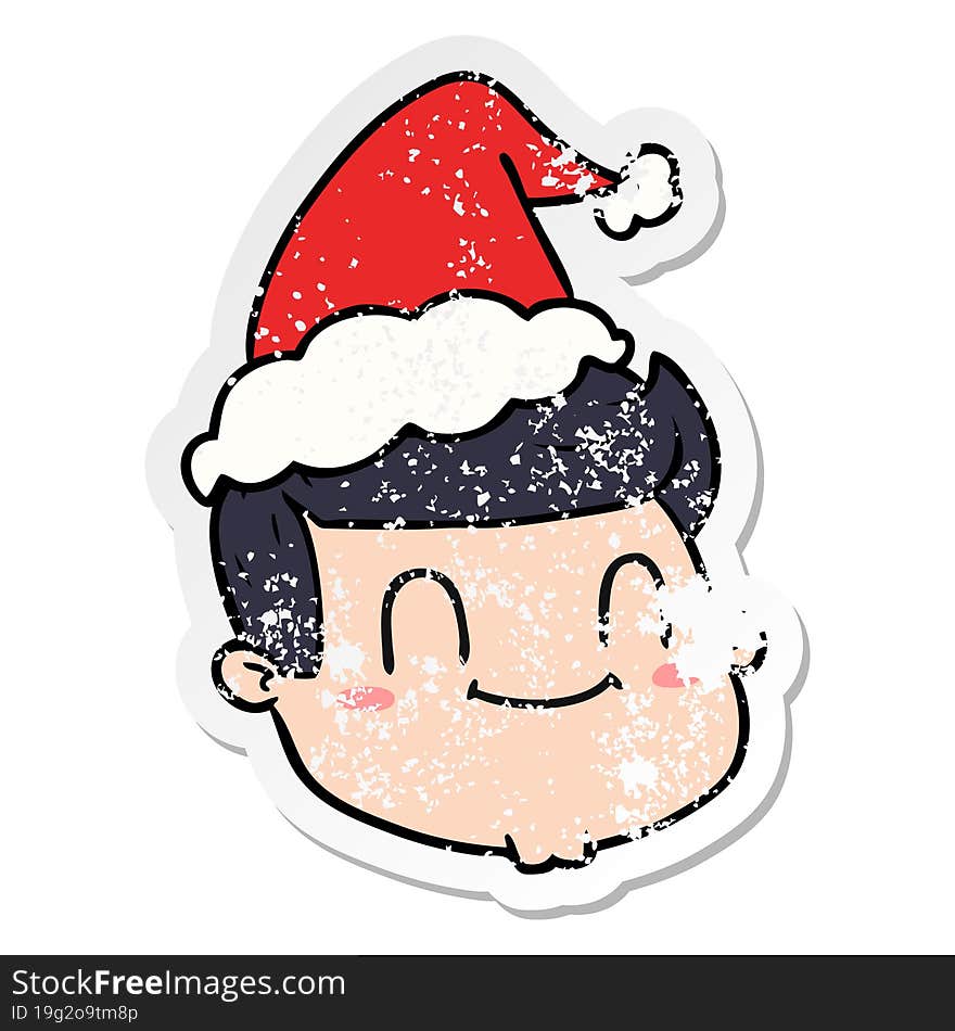 distressed sticker cartoon of a male face wearing santa hat