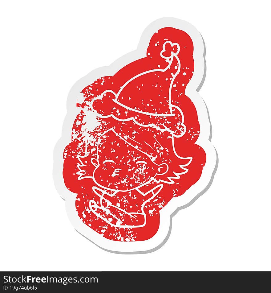 cartoon distressed sticker of a woman sitting wearing santa hat