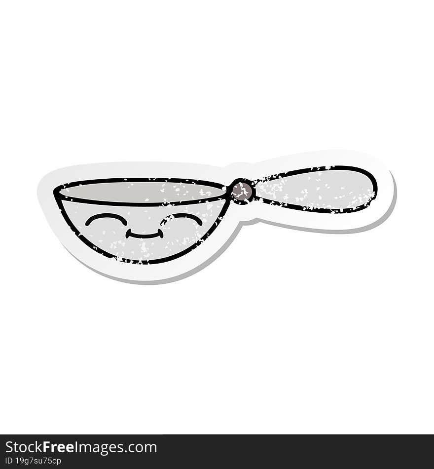 Distressed Sticker Of A Cute Cartoon Measuring Spoon