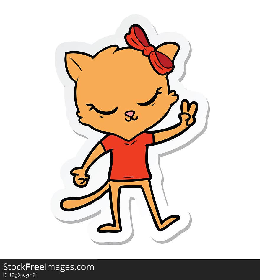 sticker of a cute cartoon cat with bow