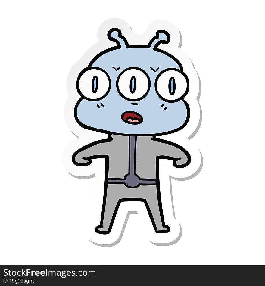 sticker of a cartoon three eyed alien