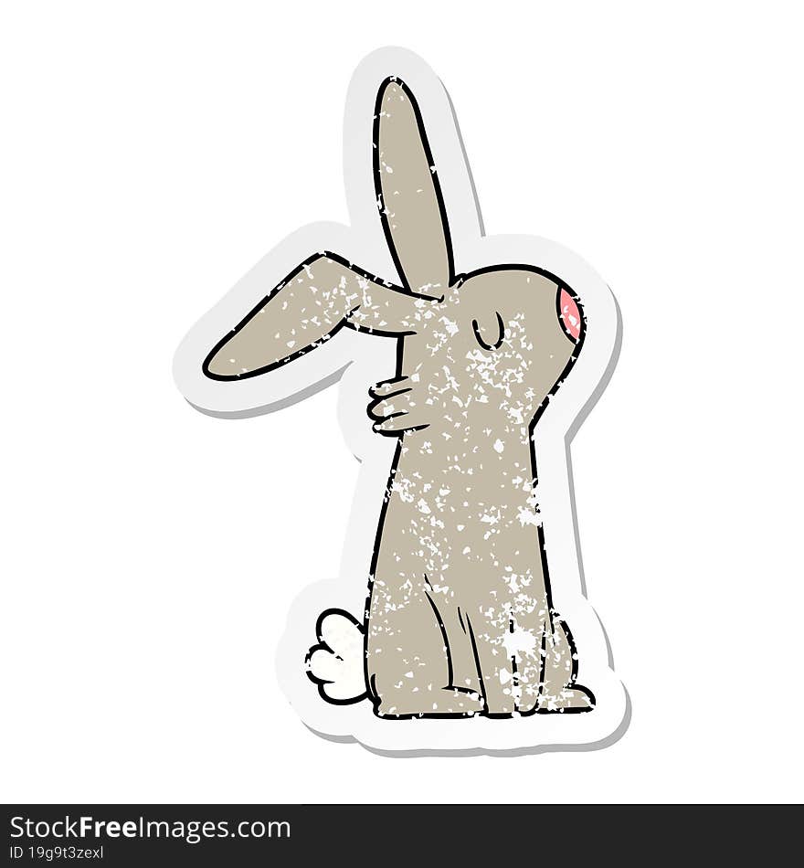 distressed sticker of a cartoon rabbit