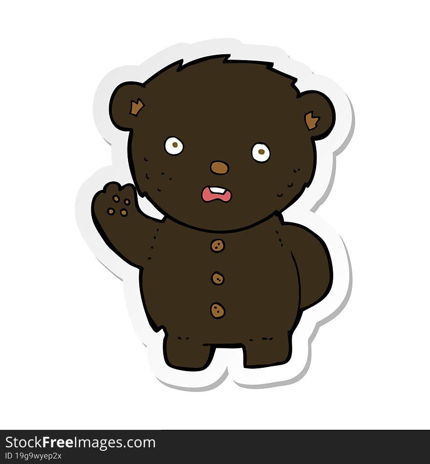 sticker of a cartoon unhappy black teddy bear