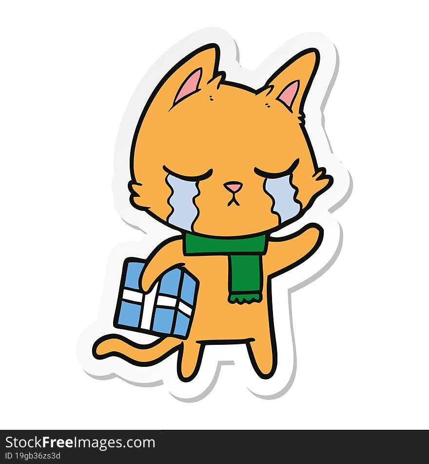 sticker of a crying cartoon cat holding christmas present