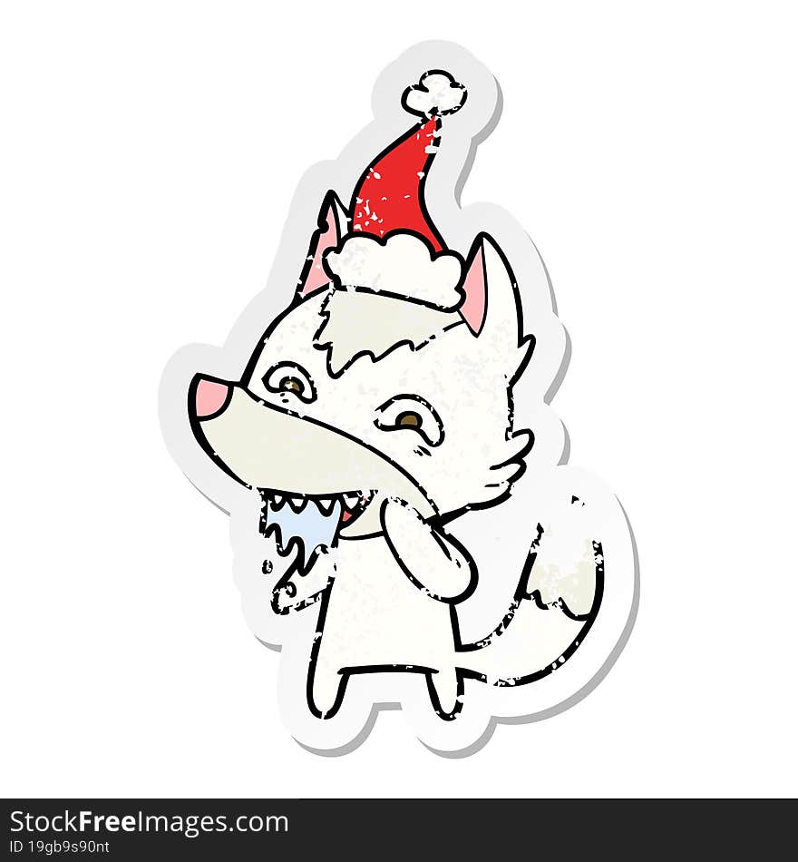 Distressed Sticker Cartoon Of A Hungry Wolf Wearing Santa Hat