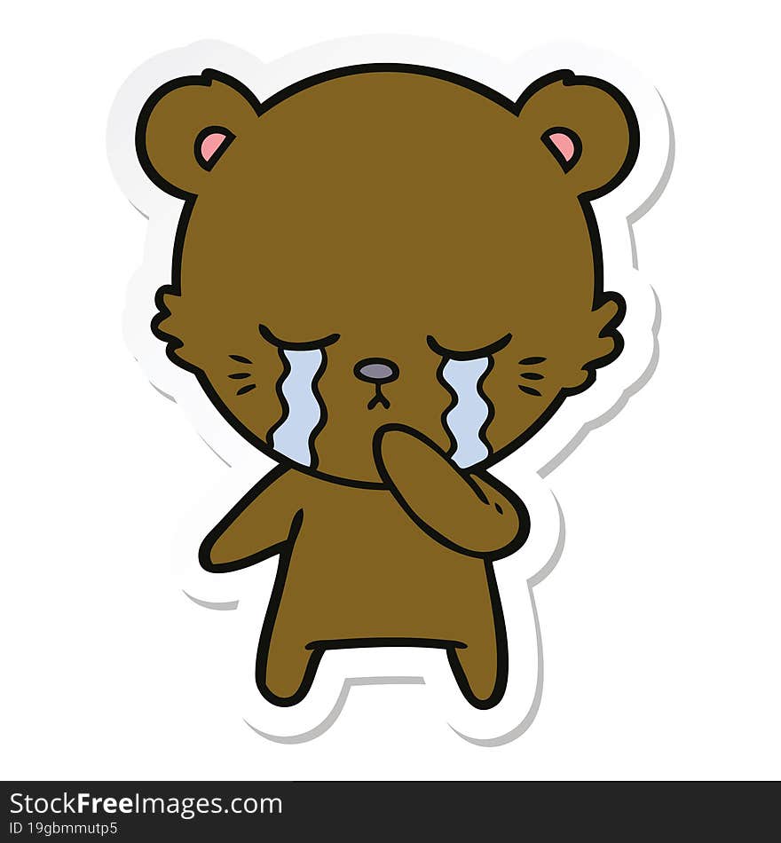 sticker of a crying cartoon bear