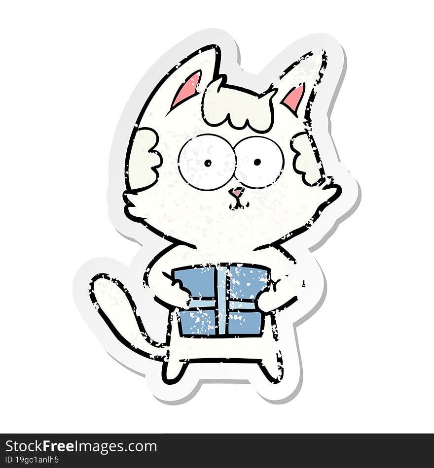 distressed sticker of a happy cartoon cat with present