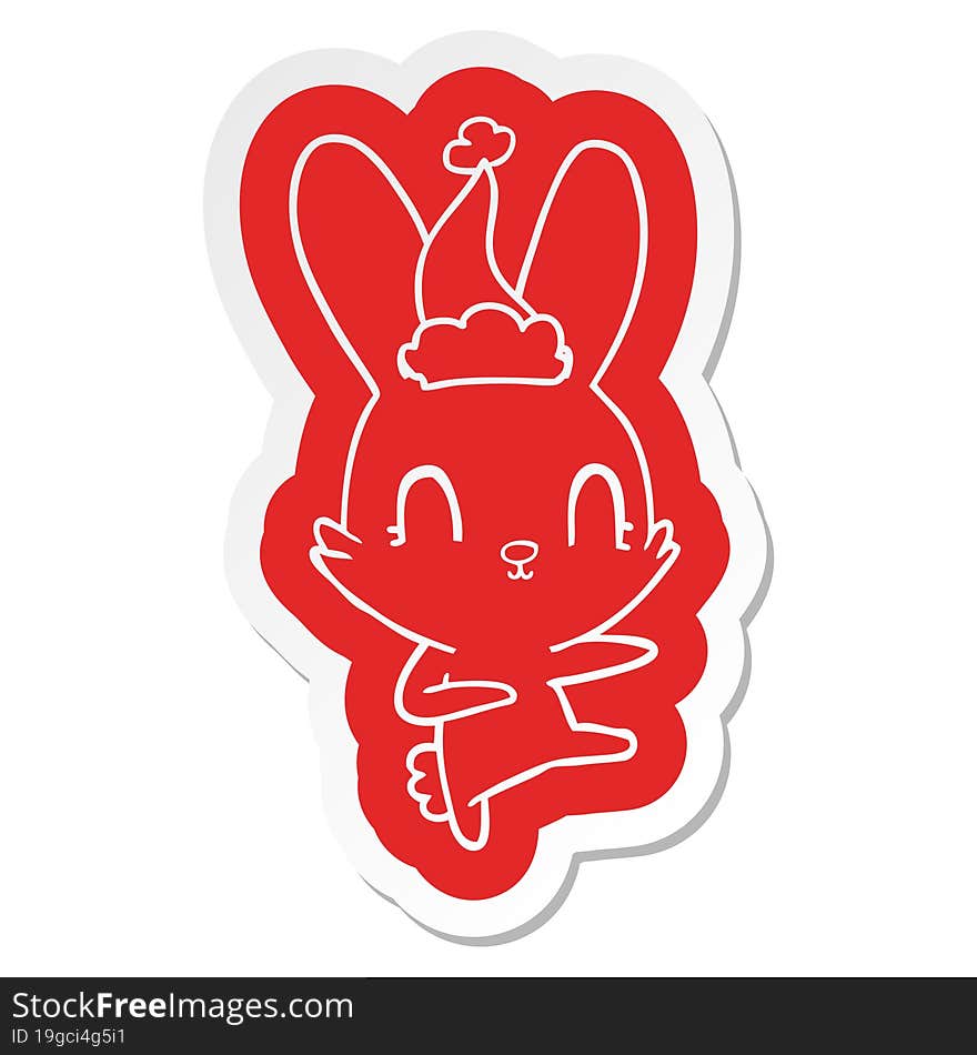 cute cartoon  sticker of a rabbit dancing wearing santa hat