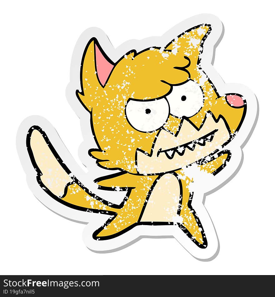 distressed sticker of a cartoon grinning fox