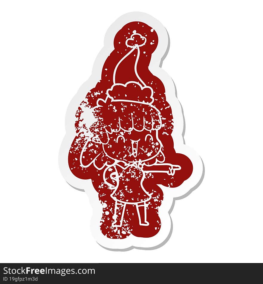 cartoon distressed sticker of a happy girl wearing santa hat