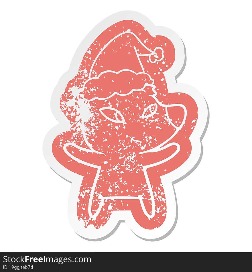 cute cartoon distressed sticker of a bear wearing santa hat