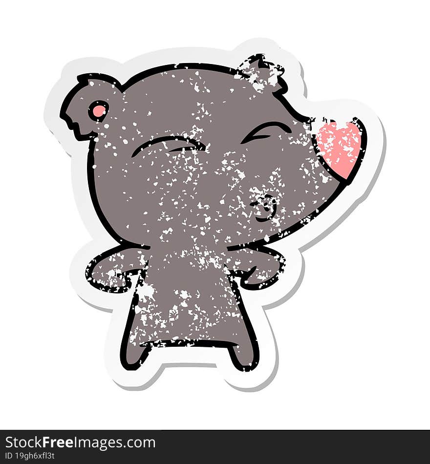 distressed sticker of a cartoon whistling bear