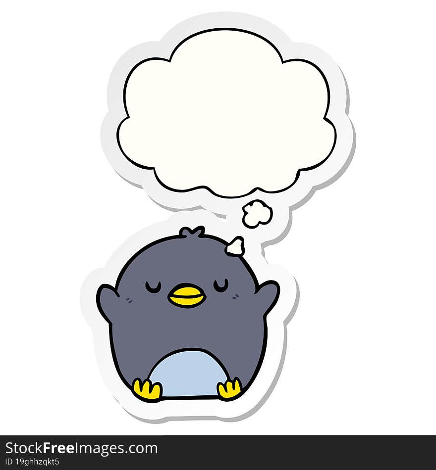 cartoon penguin and thought bubble as a printed sticker