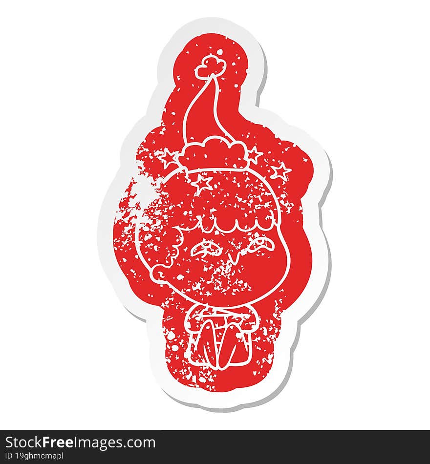 quirky cartoon distressed sticker of a amazed boy wearing santa hat