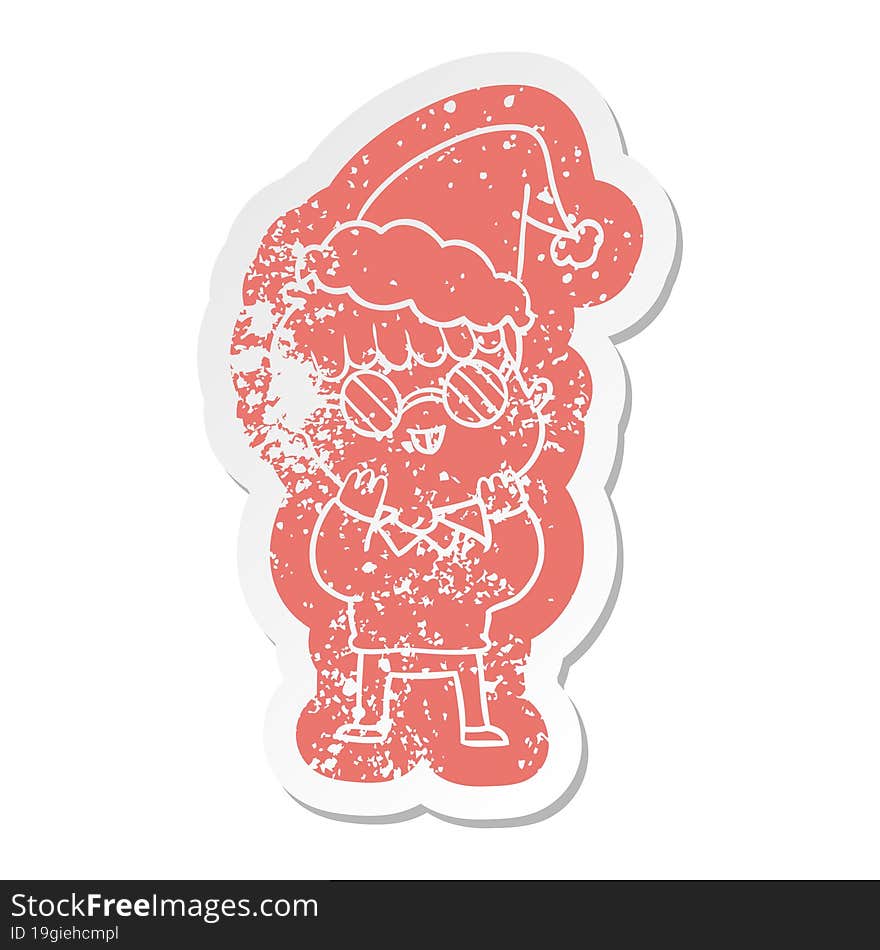 cartoon distressed sticker of a boy wearing spectacles wearing santa hat