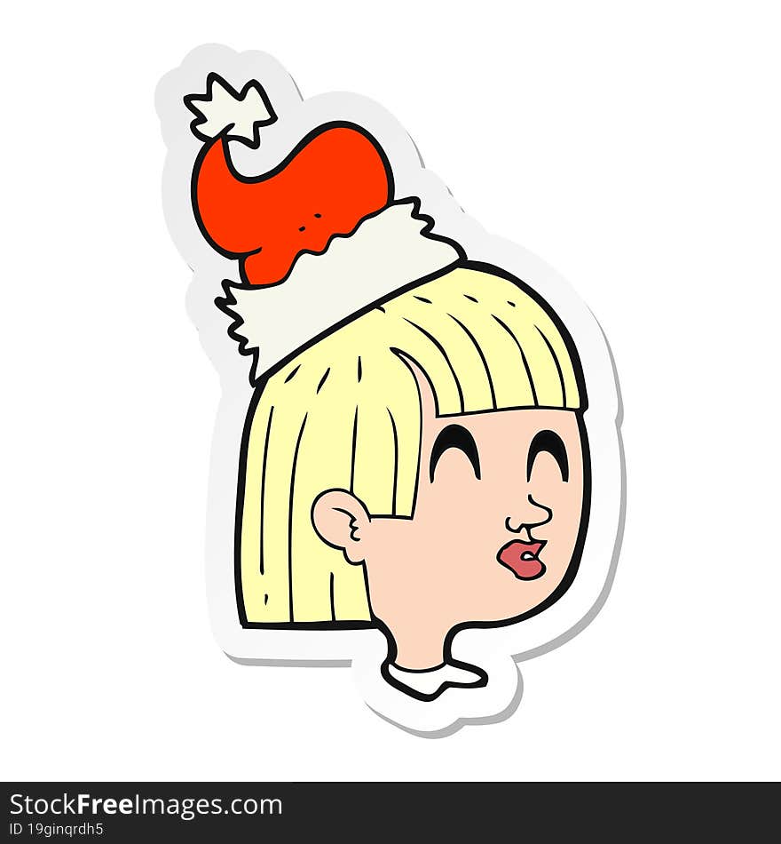 sticker of a cartoon girl wearing santa hat