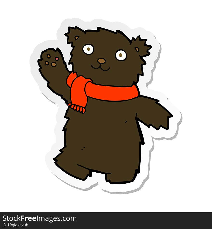 sticker of a cartoon teddy bear wearing scarf