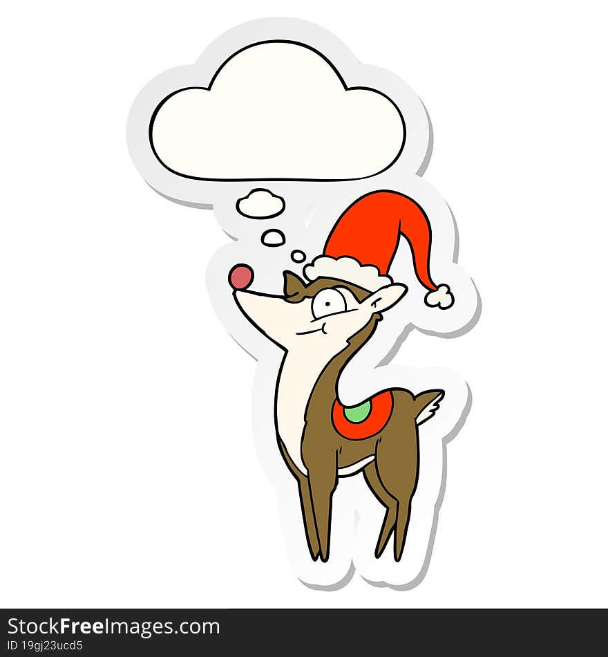 cartoon christmas reindeer with thought bubble as a printed sticker