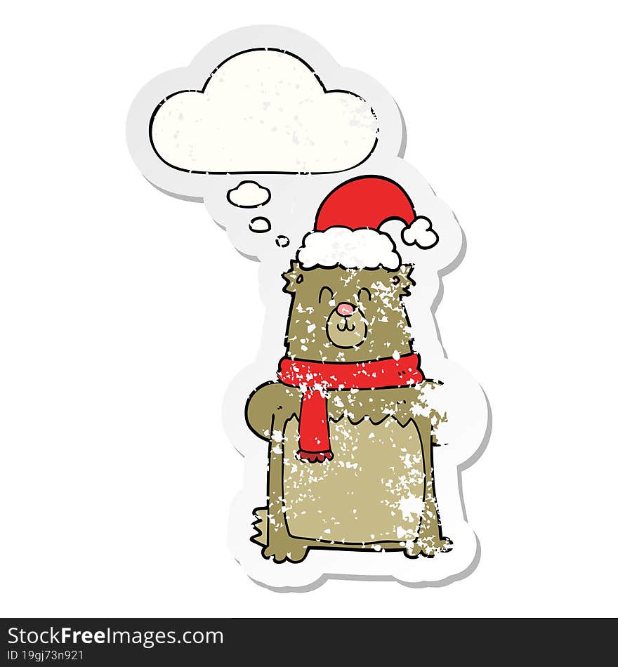 cartoon bear wearing christmas hat and thought bubble as a distressed worn sticker