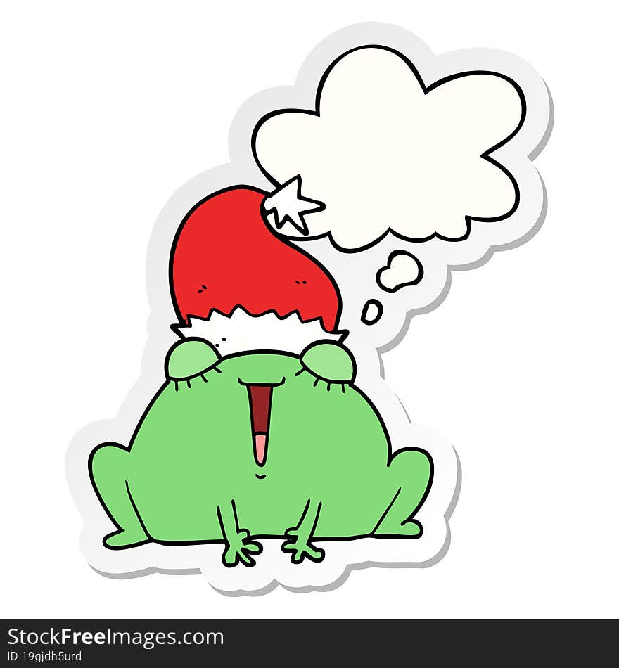 cute cartoon christmas frog with thought bubble as a printed sticker