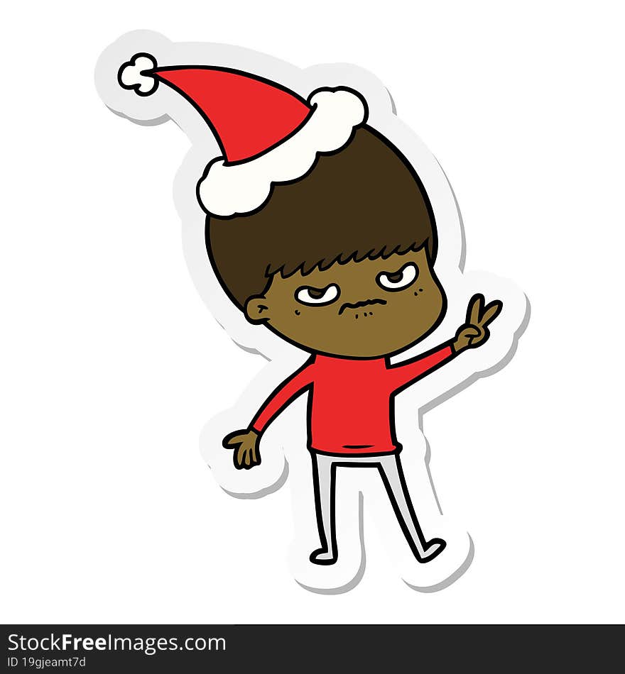 annoyed sticker cartoon of a boy wearing santa hat