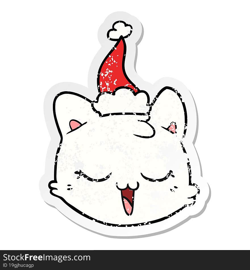 distressed sticker cartoon of a cat face wearing santa hat