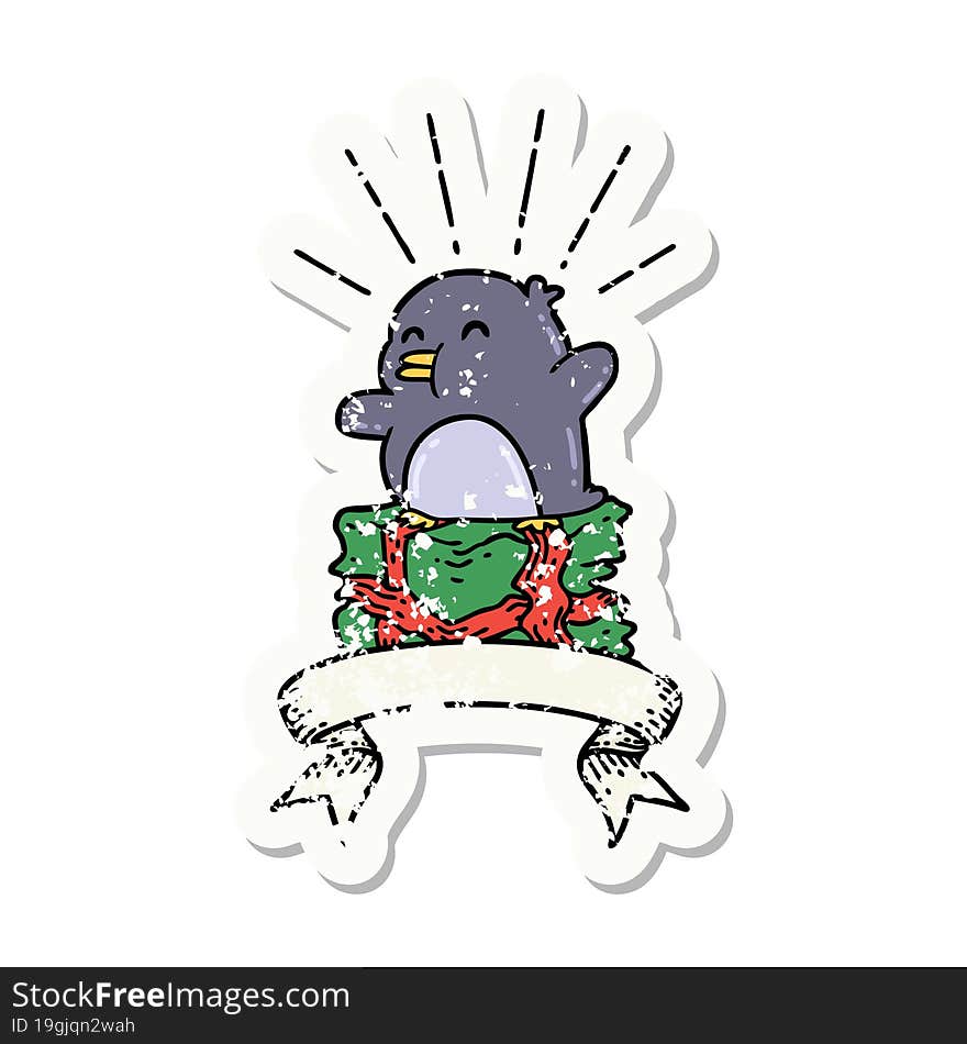 grunge sticker of tattoo style penguin sitting on present