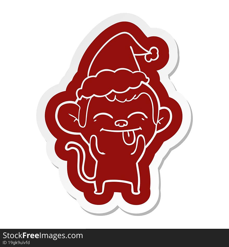 funny cartoon  sticker of a monkey wearing santa hat