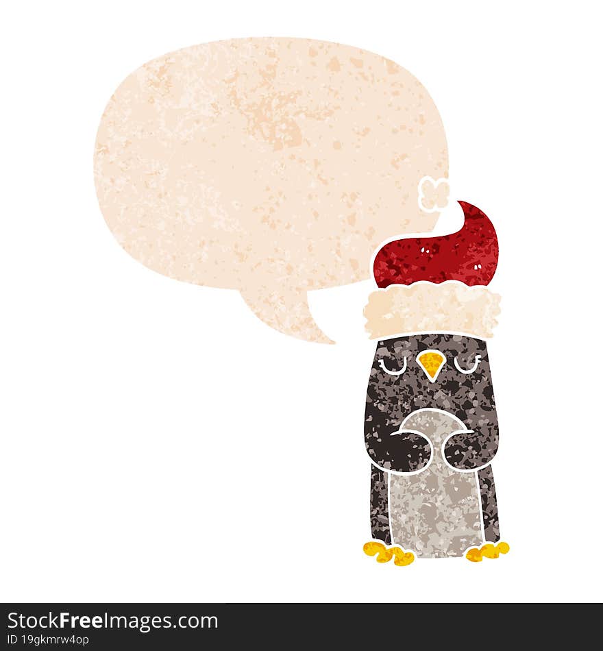 cartoon christmas penguin and speech bubble in retro textured style