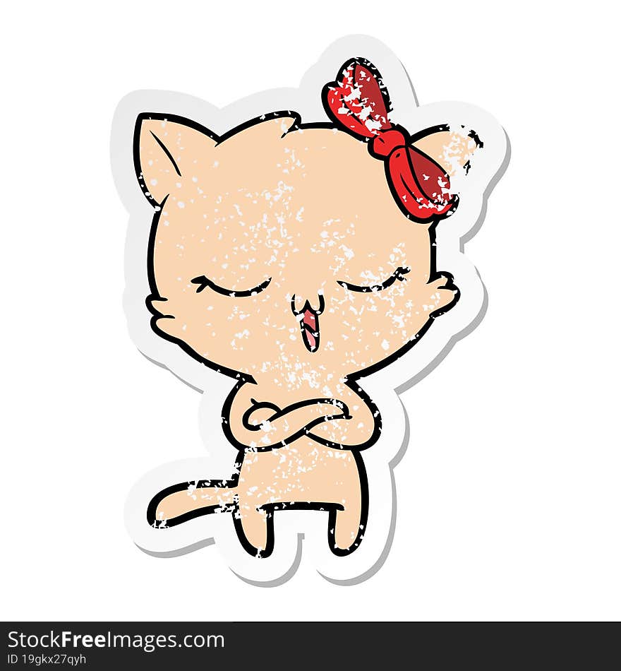 distressed sticker of a cartoon cat with bow on head