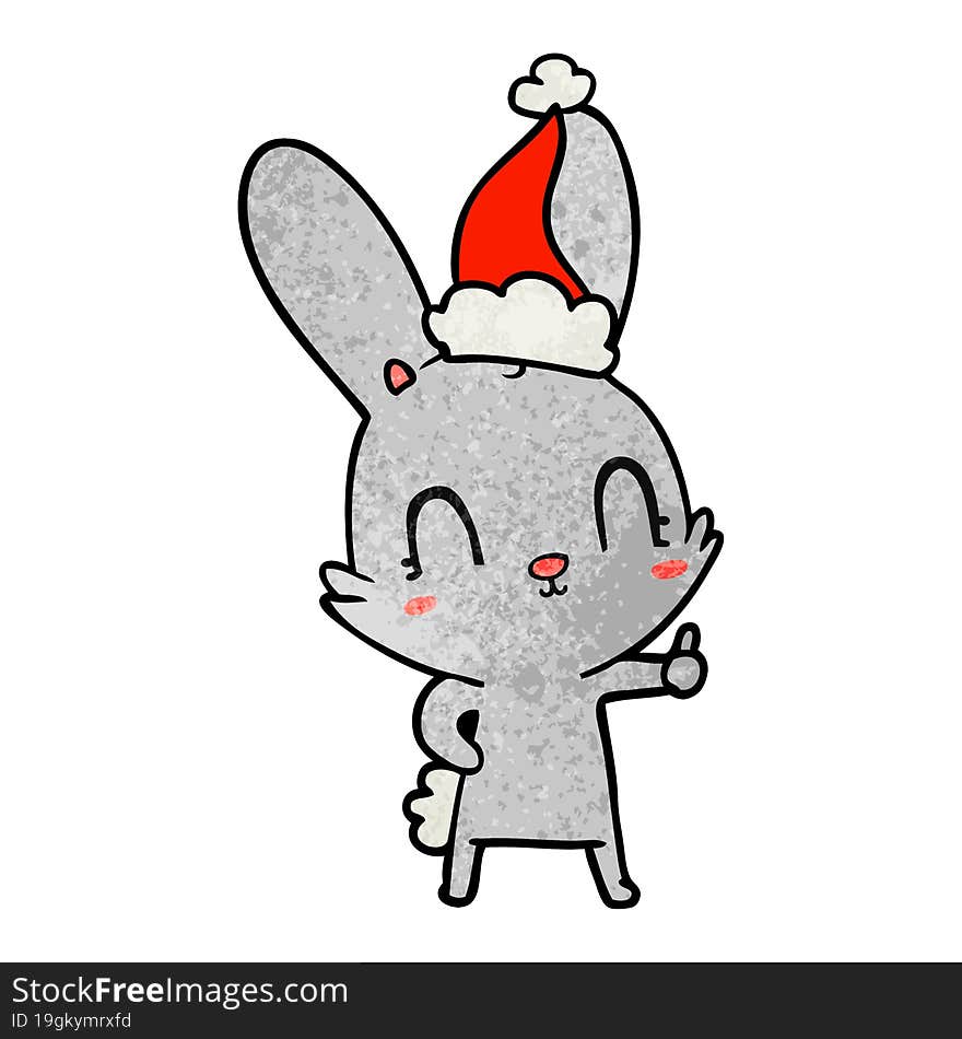 cute hand drawn textured cartoon of a rabbit wearing santa hat. cute hand drawn textured cartoon of a rabbit wearing santa hat